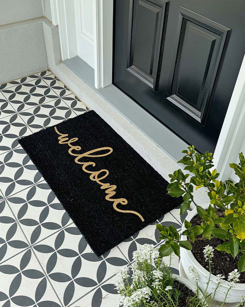 Cursive Welcome - Embossed Black Tan