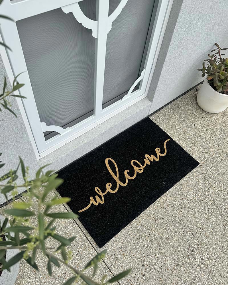 Cursive Welcome - Embossed Black Tan