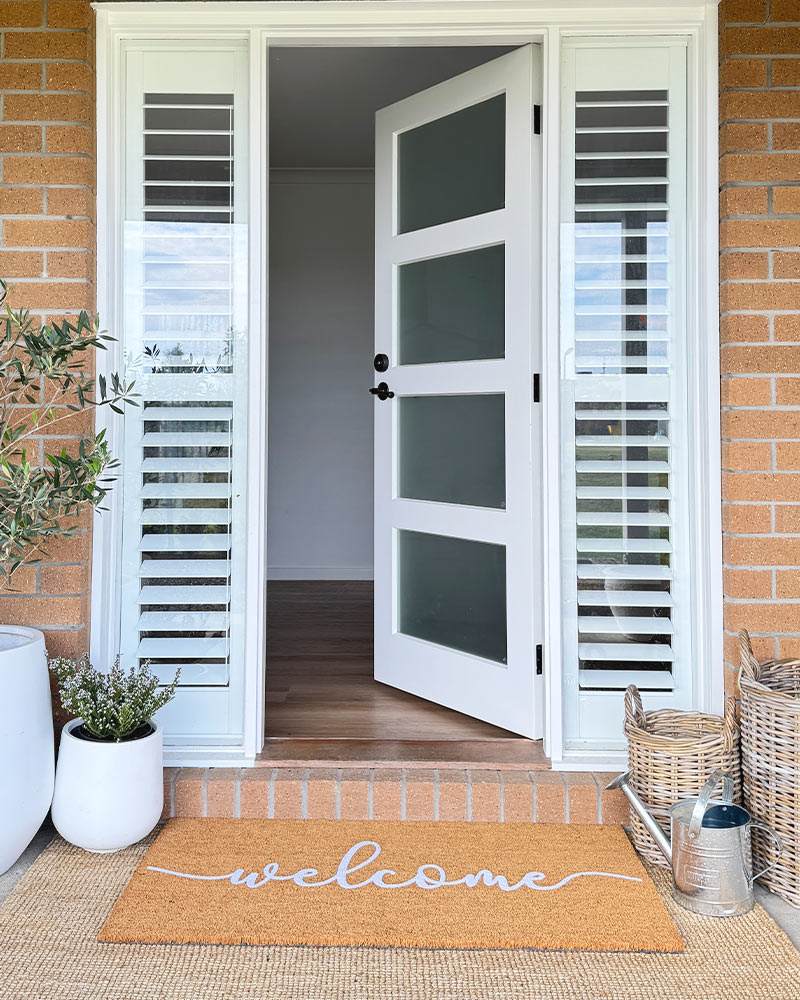 Cursive Welcome - White Embossed Coir Doormat